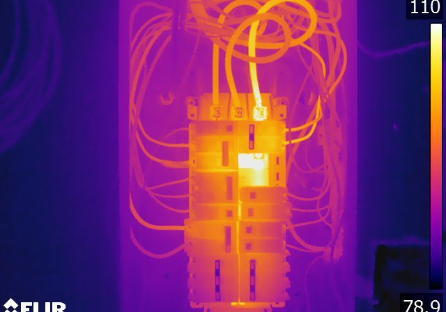 Thermal image showing heat distribution in an electrical panel.